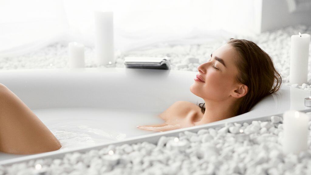 Take a hot bath to stress relief for better sleep