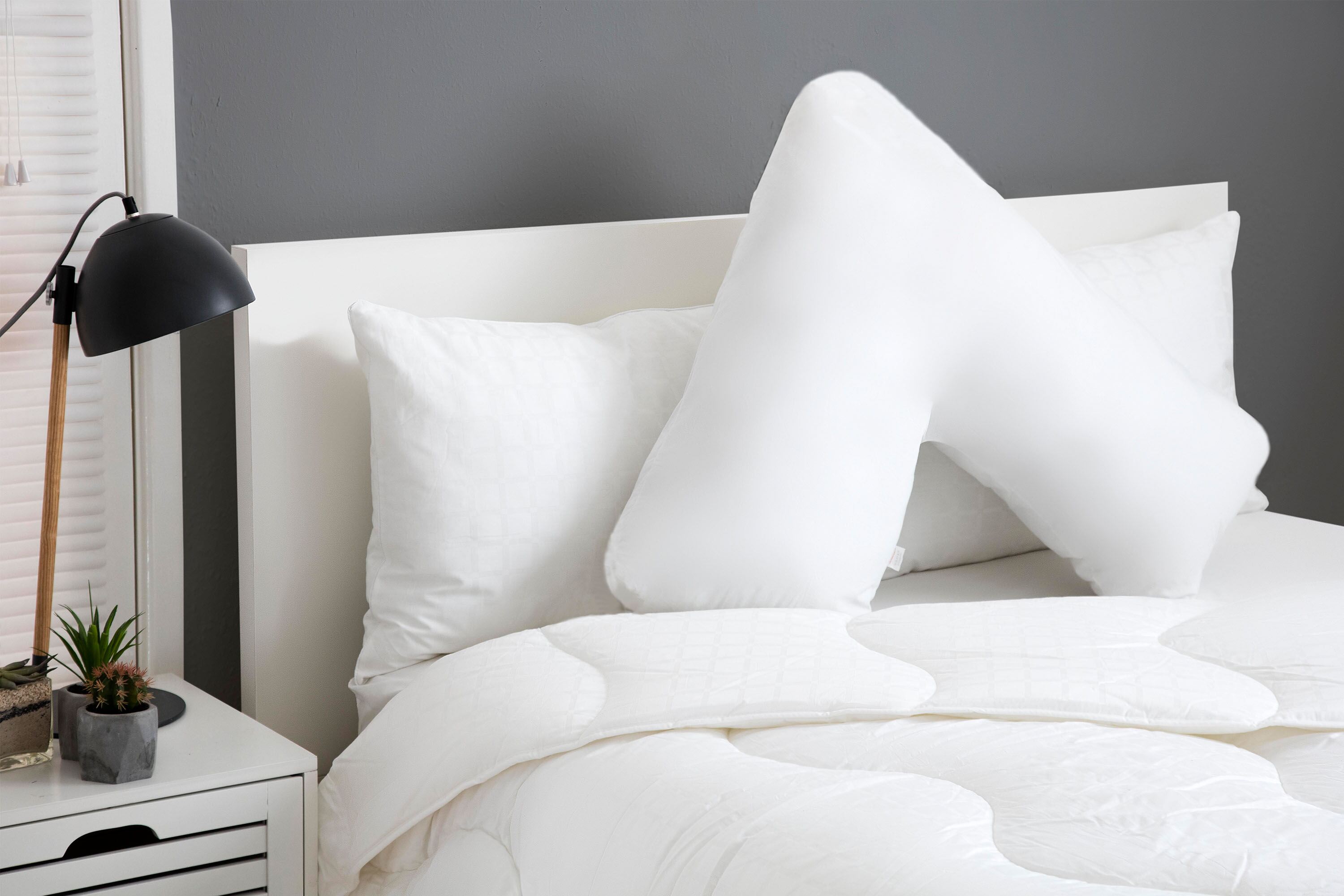 hotel_suite_v_shaped_orthopaedic_pillow_lifestyle_resized2.jpg