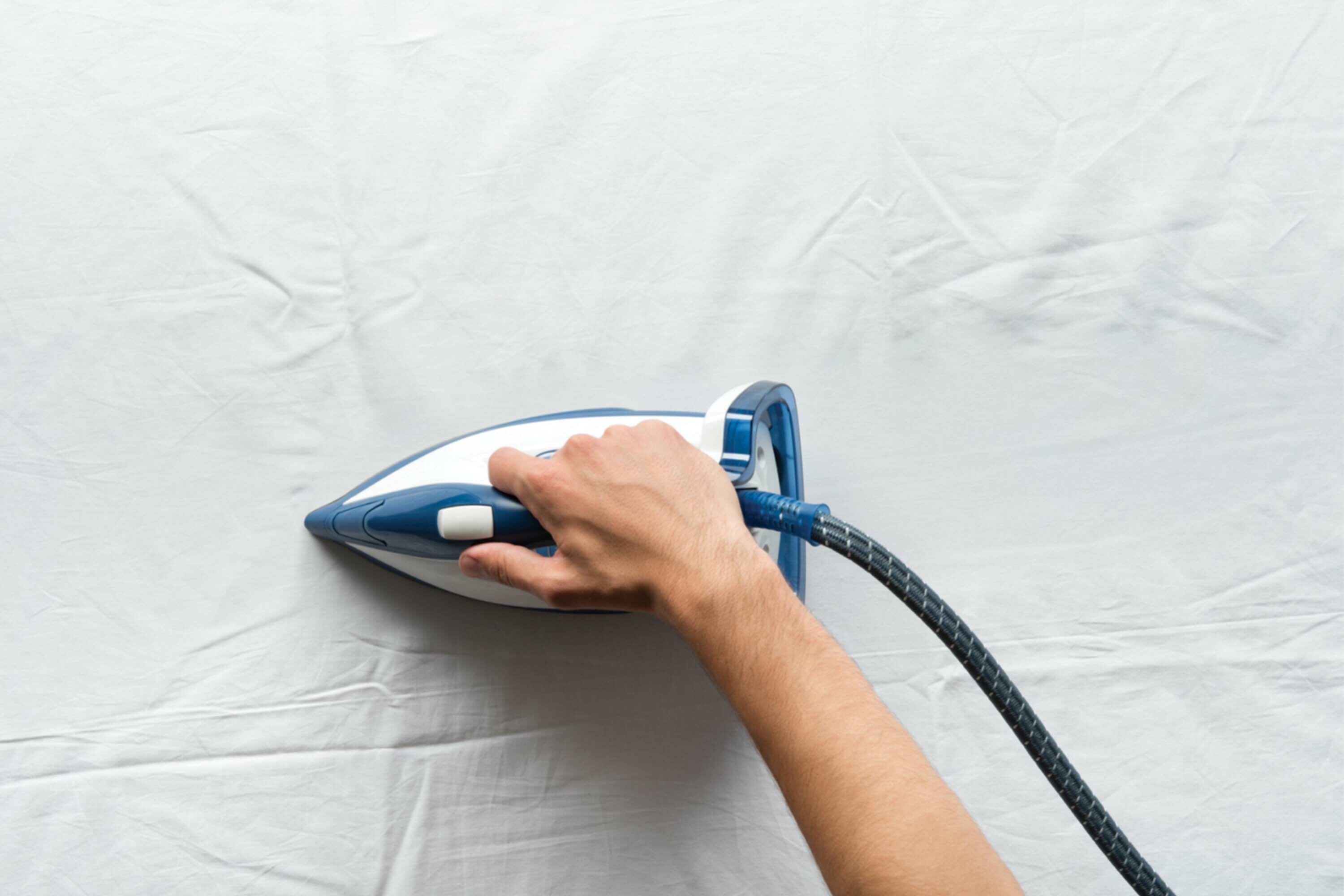 How To Iron Your Sheets Quick Easy At Home